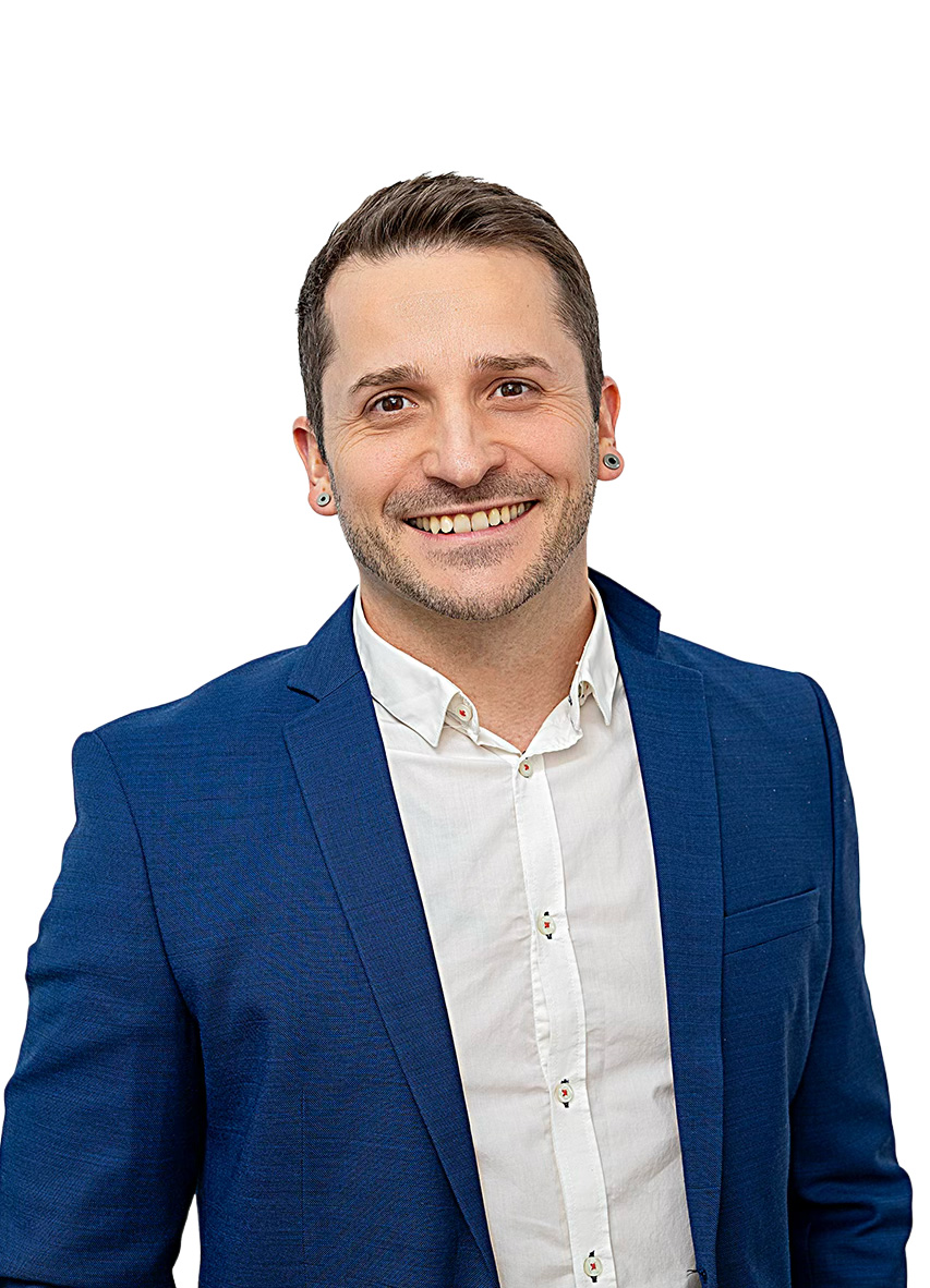 Porträt von Stefan Baum im blauen Sakko